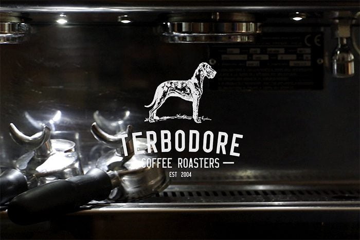 Terbodore Coffee Roasters logo on a milk steam machine - Terbodore