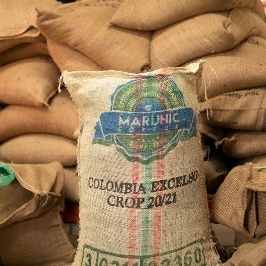 Hessian bags filled with Colombia Excelso Coffee - Terbodore